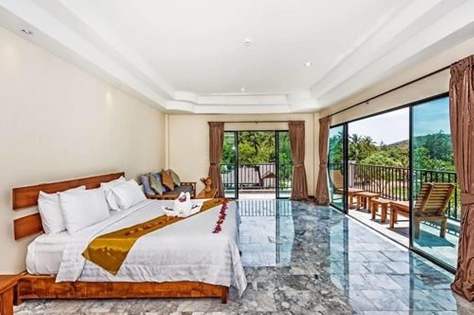 The Windmill Phuket Hotel Rawai Exterior foto
